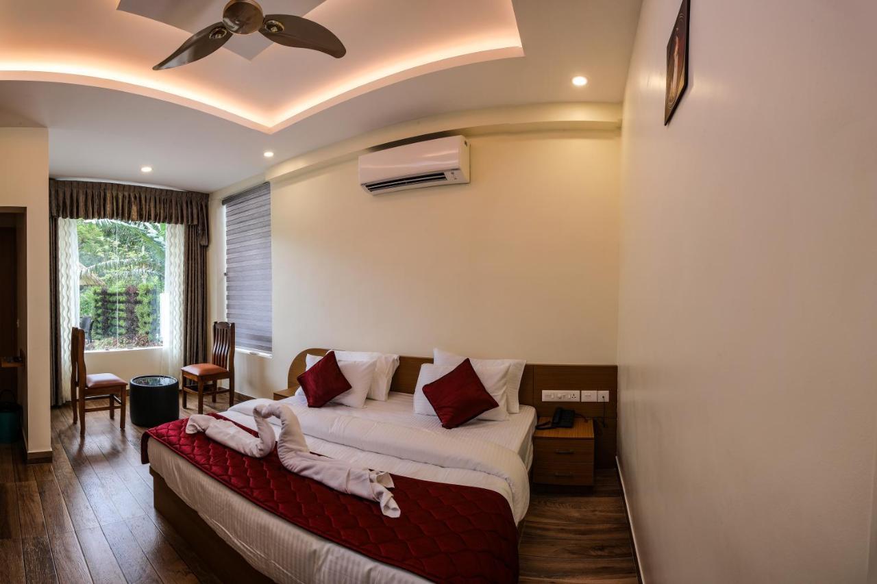 Thenmala Hormuz Inn Kolattupuzha Ngoại thất bức ảnh